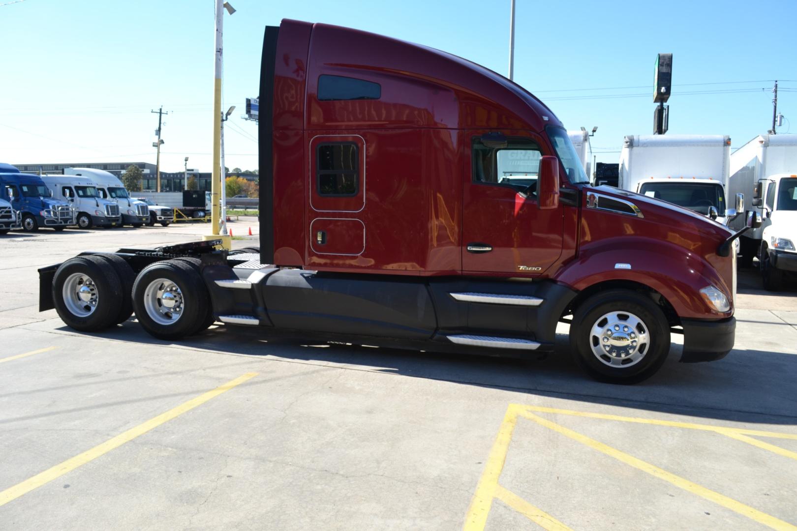 2017 MAROON KENWORTH T680 with an PACCAR MX13 12.9L 455HP engine, ULTRASHIFT 10SPD AUTOMATIC transmission, located at 9172 North Fwy, Houston, TX, 77037, (713) 910-6868, 29.887470, -95.411903 - 76" RAISED ROOF SLEEPER, DOUBLE BUNK, DUAL 135 GALLON FUEL TANKS, WB: 230", RATIO: 3.36, ALUMINUM WHEELS, BUILT-IN NAVIGATION, CRUISE CONTROL, POWER WINDOWS, LOCKS, & MIRRORS, ENGINE BRAKE, 53,200LB GVWR - Photo#3